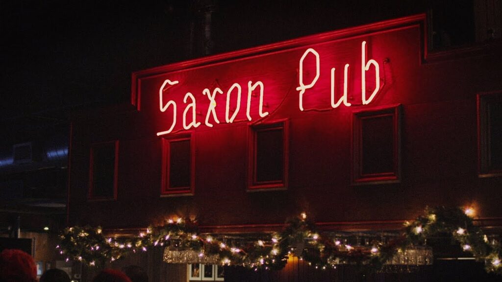 The Saxon Pub's facade and neon sign